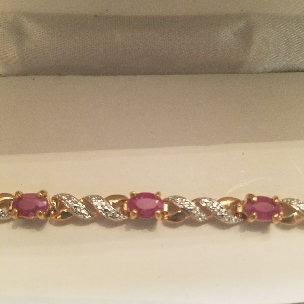 Lovely pink sapphire & gold bracelet.